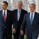 President Barack Obama walks down the West Wing Colonnade alongside former Presidents Bill Clinton and George W. Bush during a statement in the Rose Garden of the White House in Washington, D.C., on Jan. 16, 2010.
SAUL LOEB/AFP/Getty Images